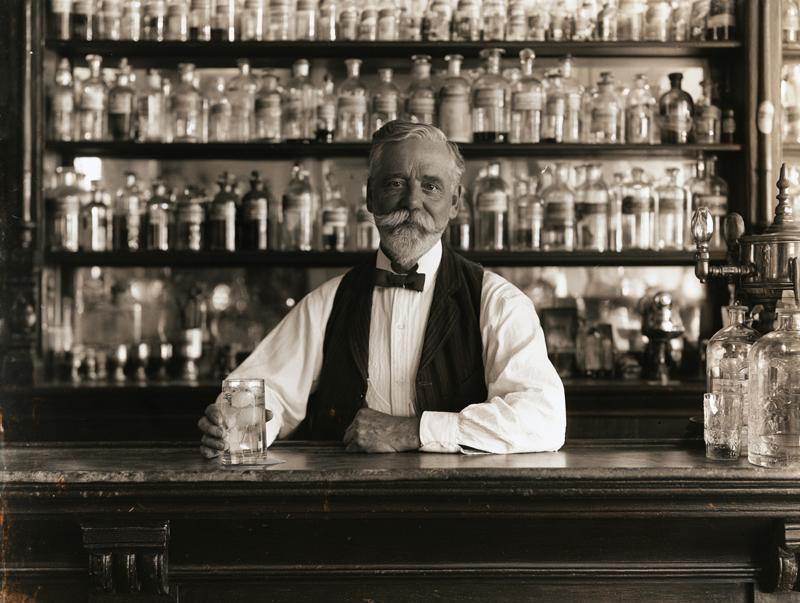 A pharmcist at a soda fountain